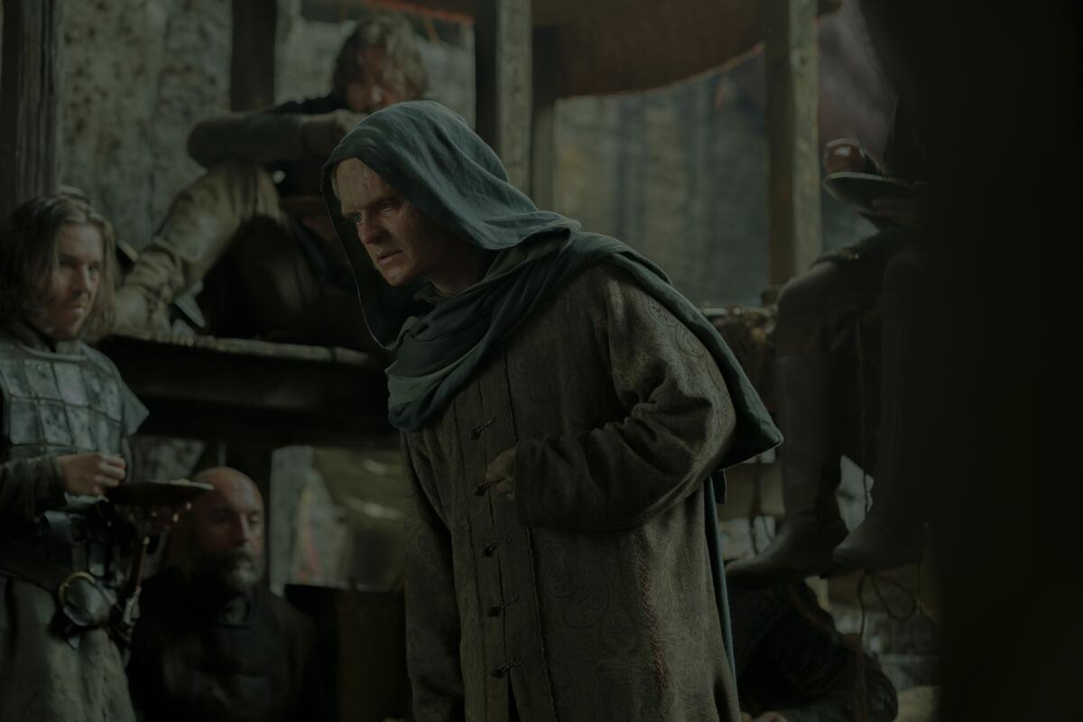Aegon wearing tattered clothes