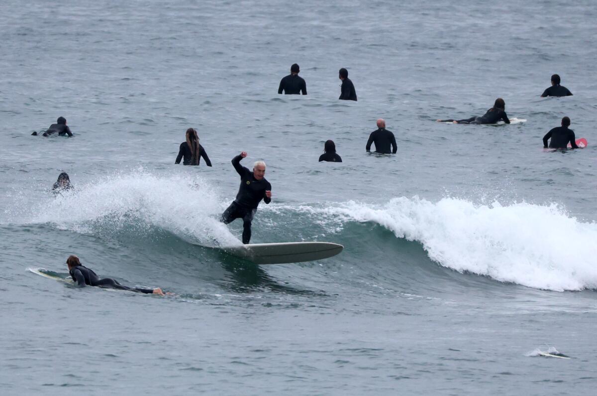 Surfers at Surfrider Beach in Malibu.