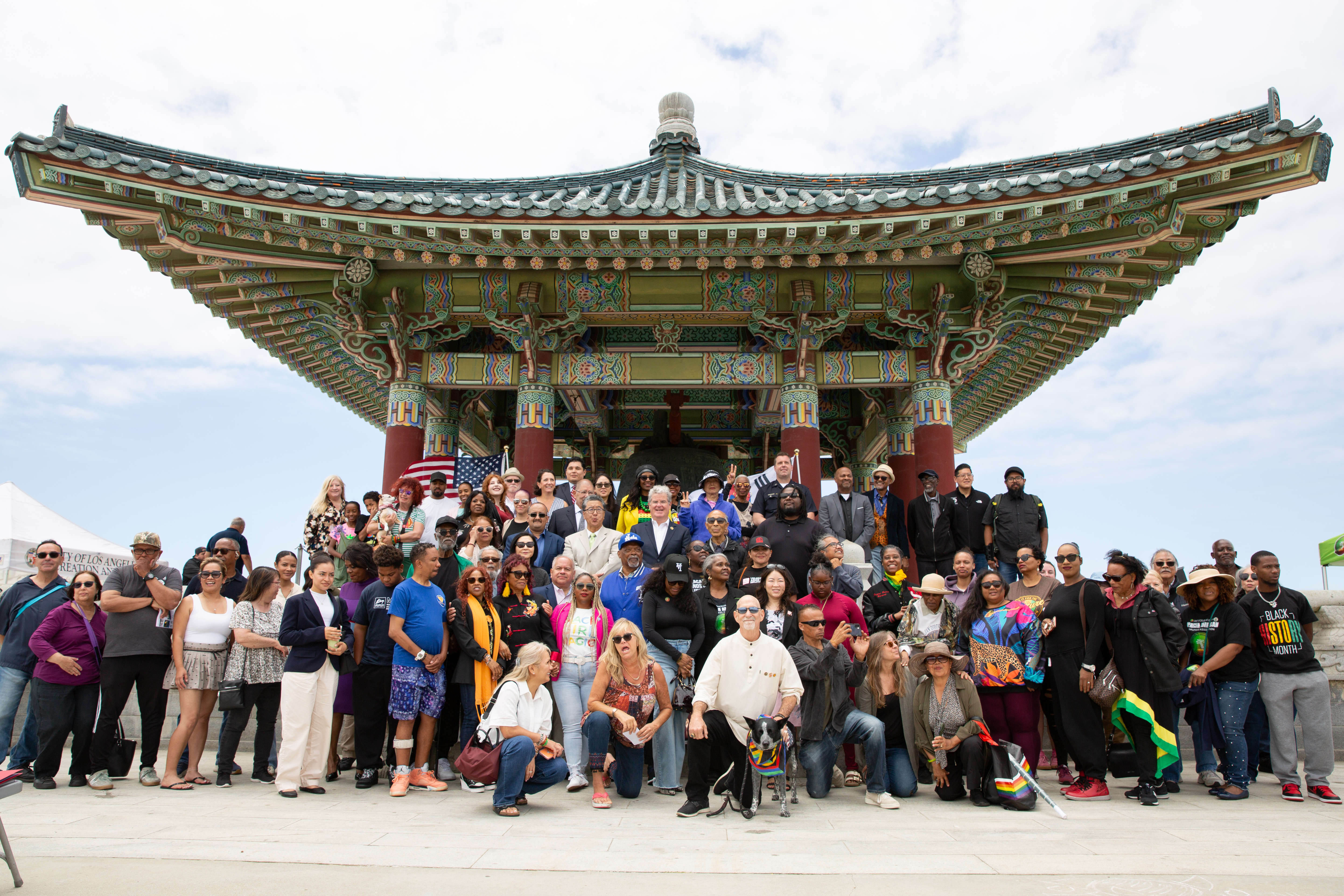 City officials, guests and attendees take a group photo together...