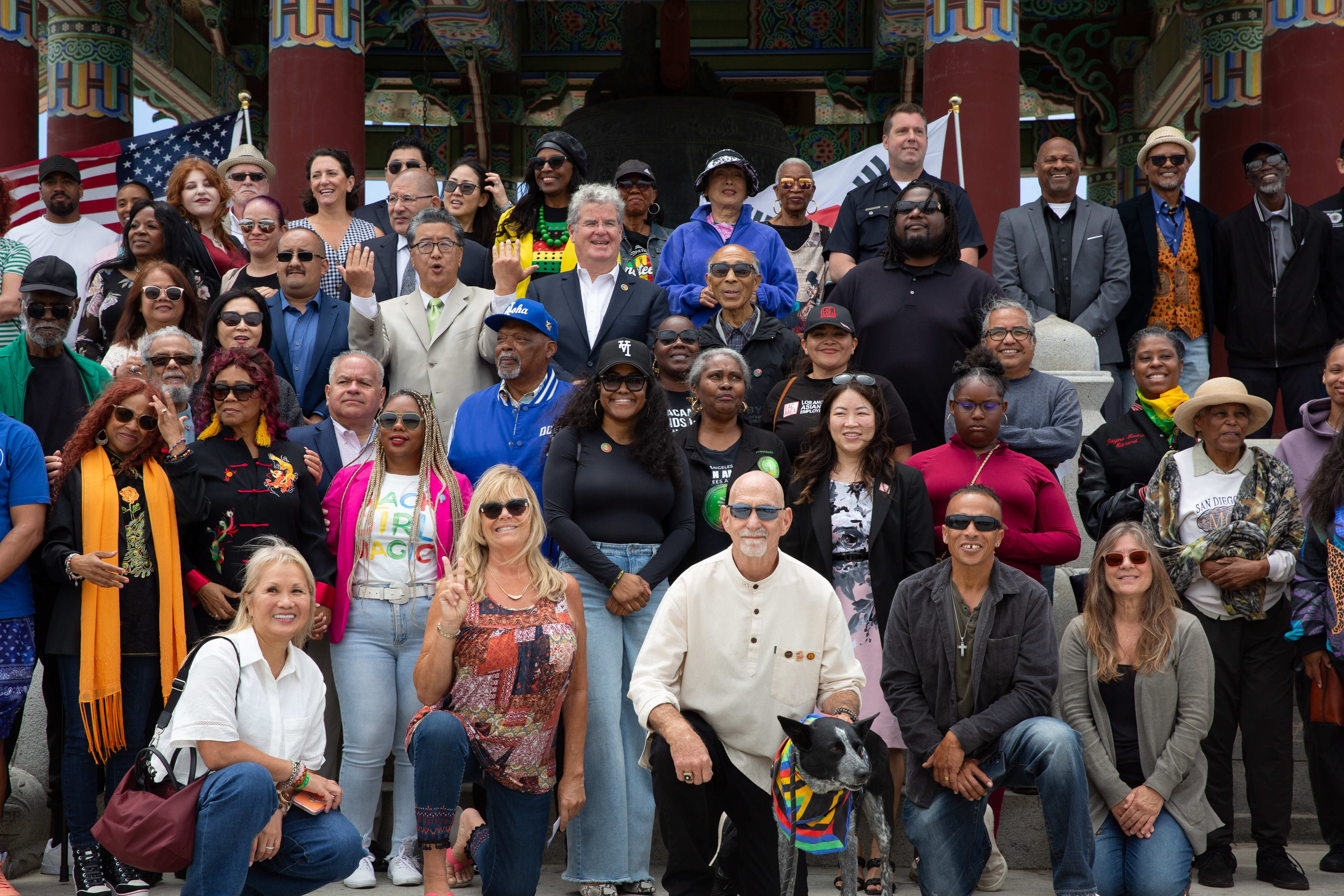 City officials, guests and attendees take a group photo together...