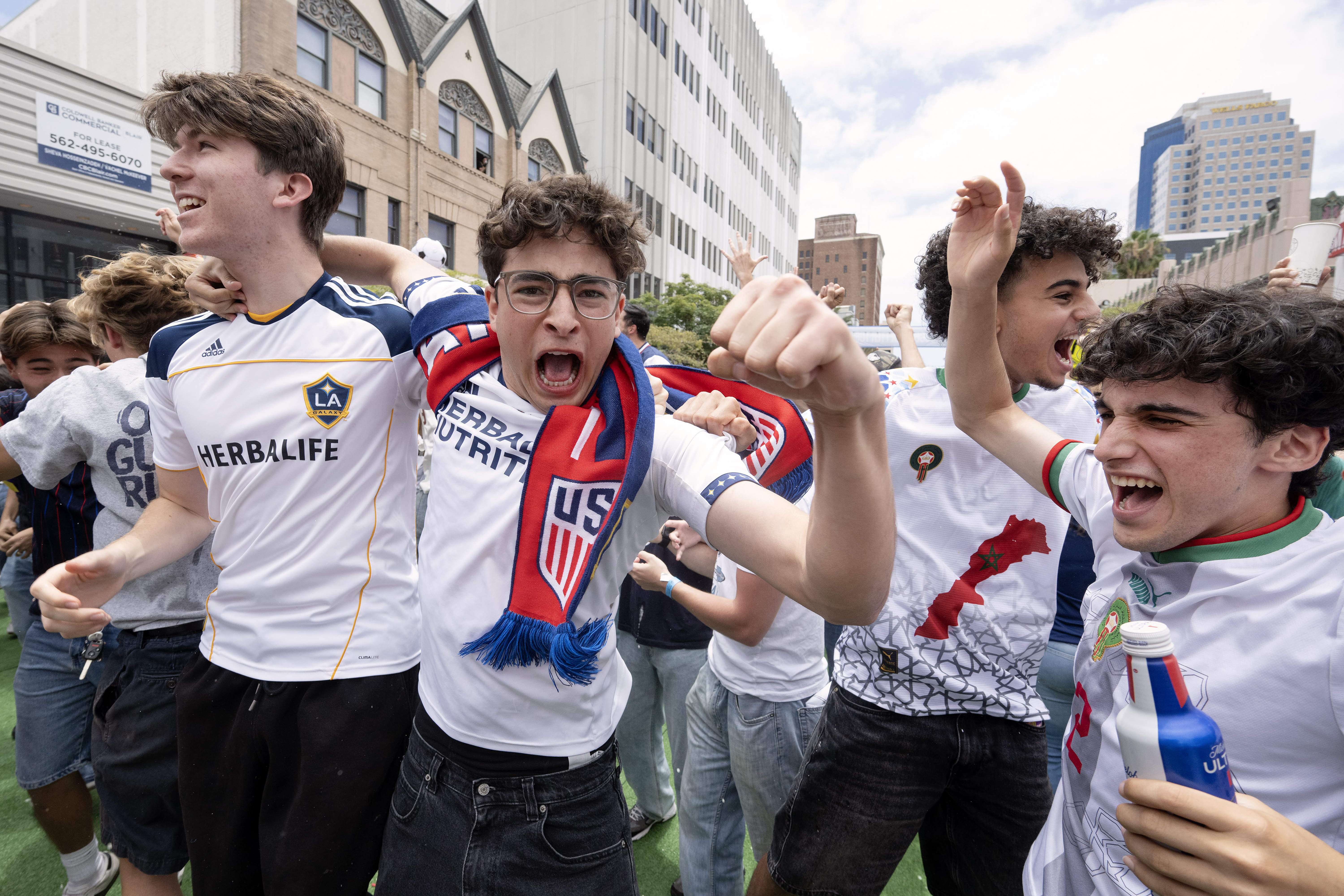 Former Beverly Hills High School soccer players celebrate after U.S.A....
