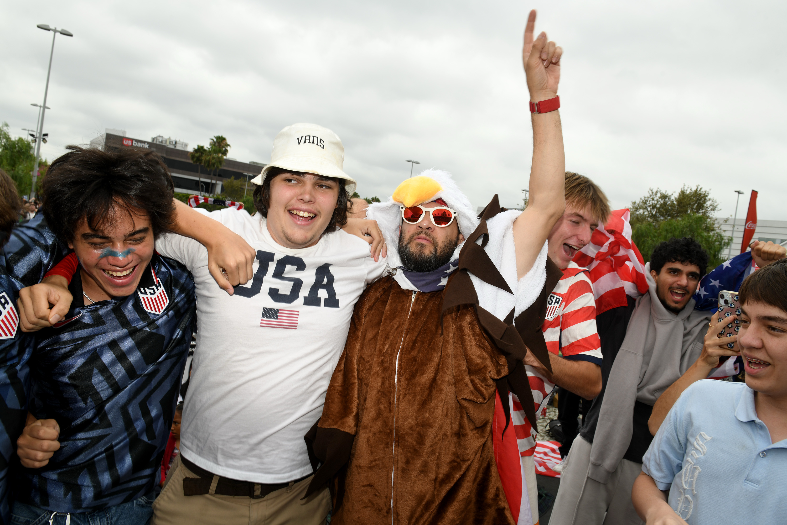 Levi Dokus, wearing a hat, and Jason Tovar with his...