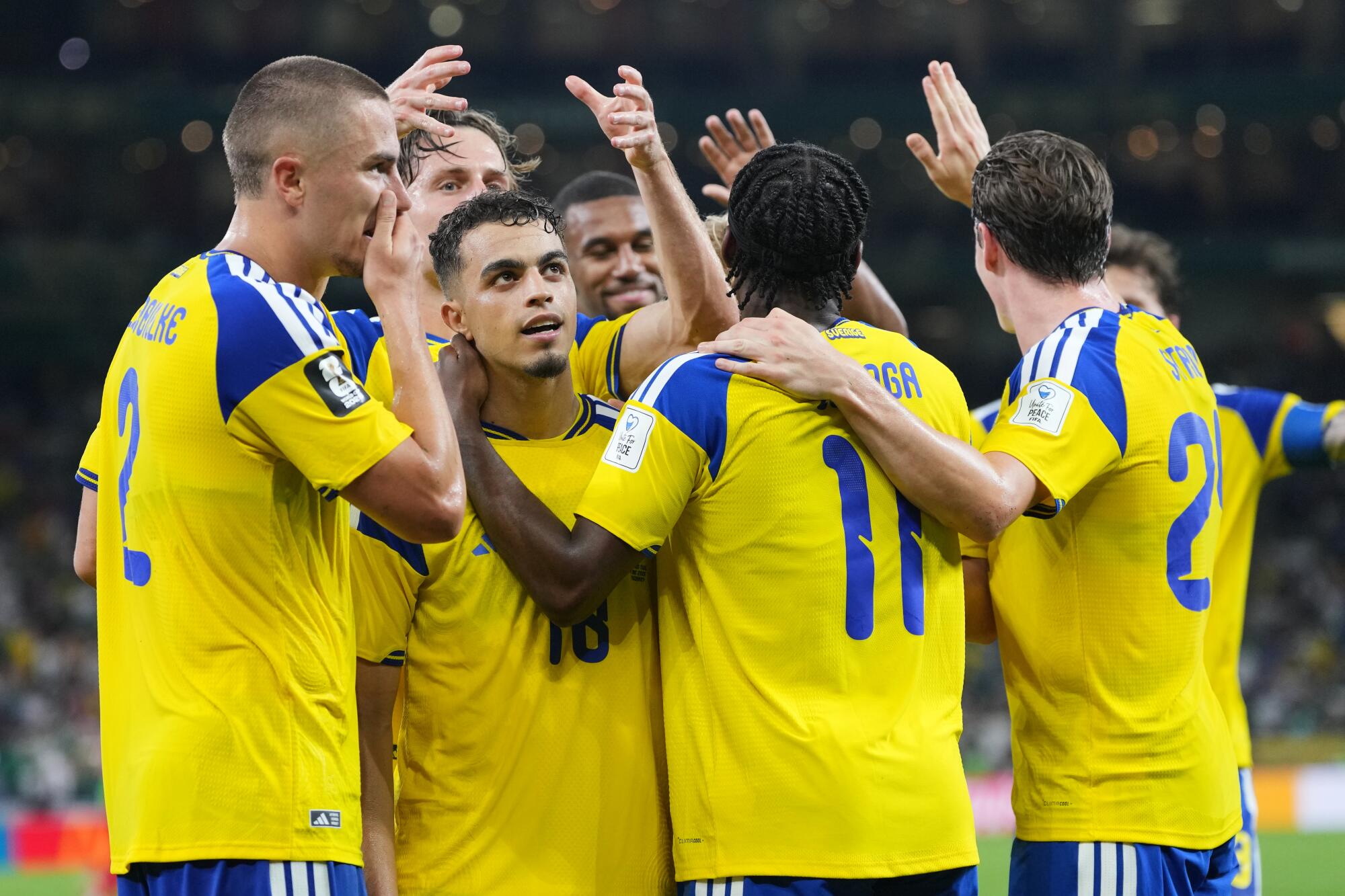 Sweden's Yasin Ayari (18) celebrates with teammates after scoring against Tunisia in the World Cup on June 14.