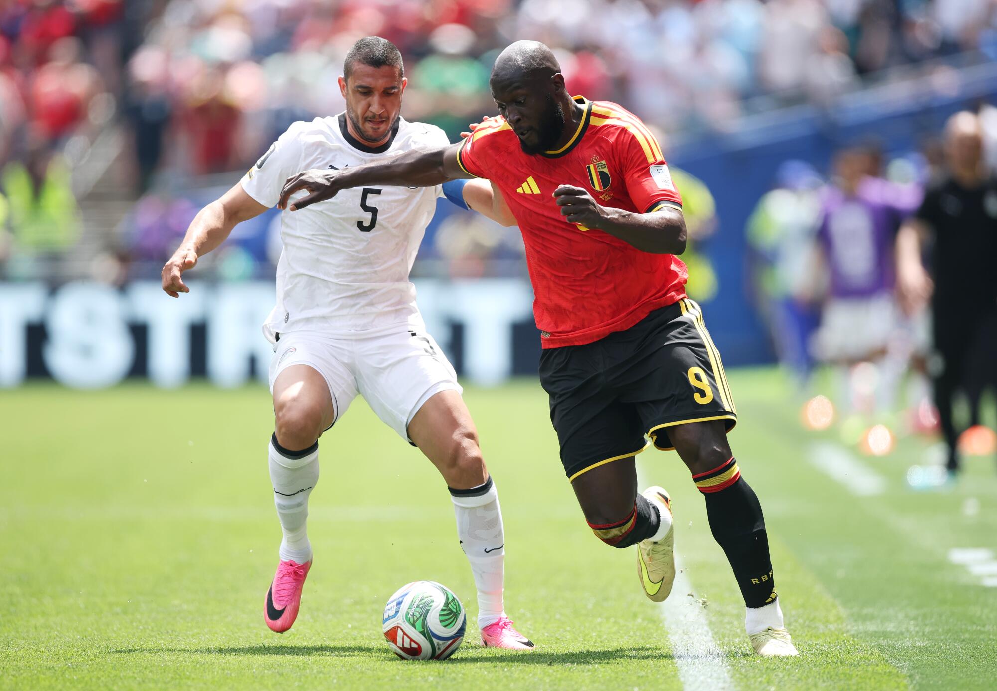 Belgium's Romelu Lukaku, right, is challenged by Egypt's Ramy Rabia during a World Cup Group G match on June 15.