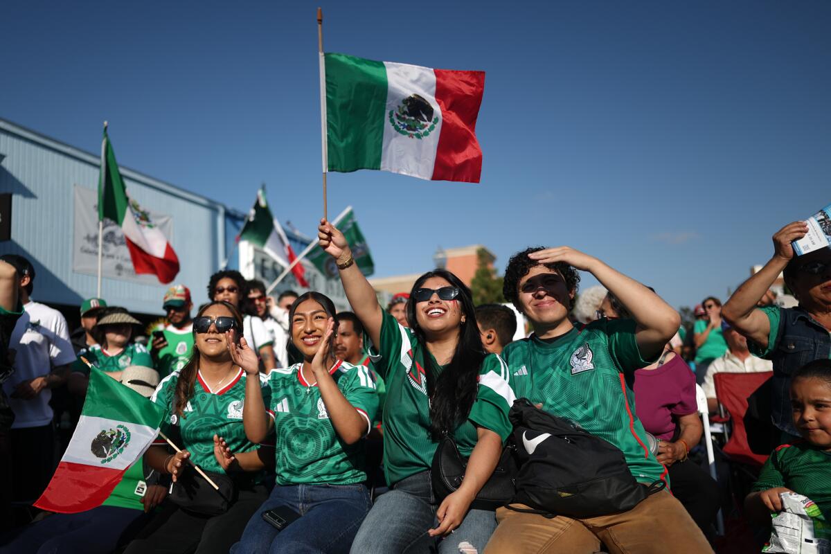 Mexico fans watch a FIFA World Cup soccer Group A matchup between Mexico and South Korea in the Boyle Heights