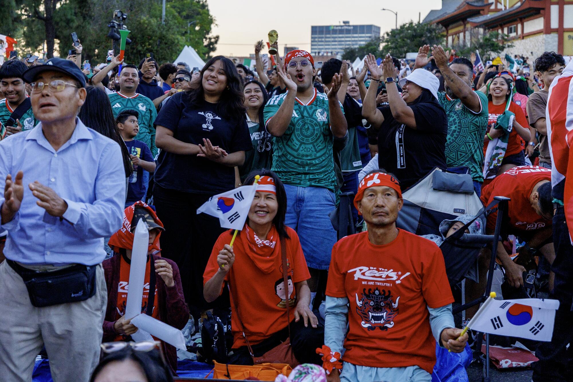 Korea and Mexico fans react during a watch party for the World Cup match Mexico vs Korea in which Mexico won 1-0.