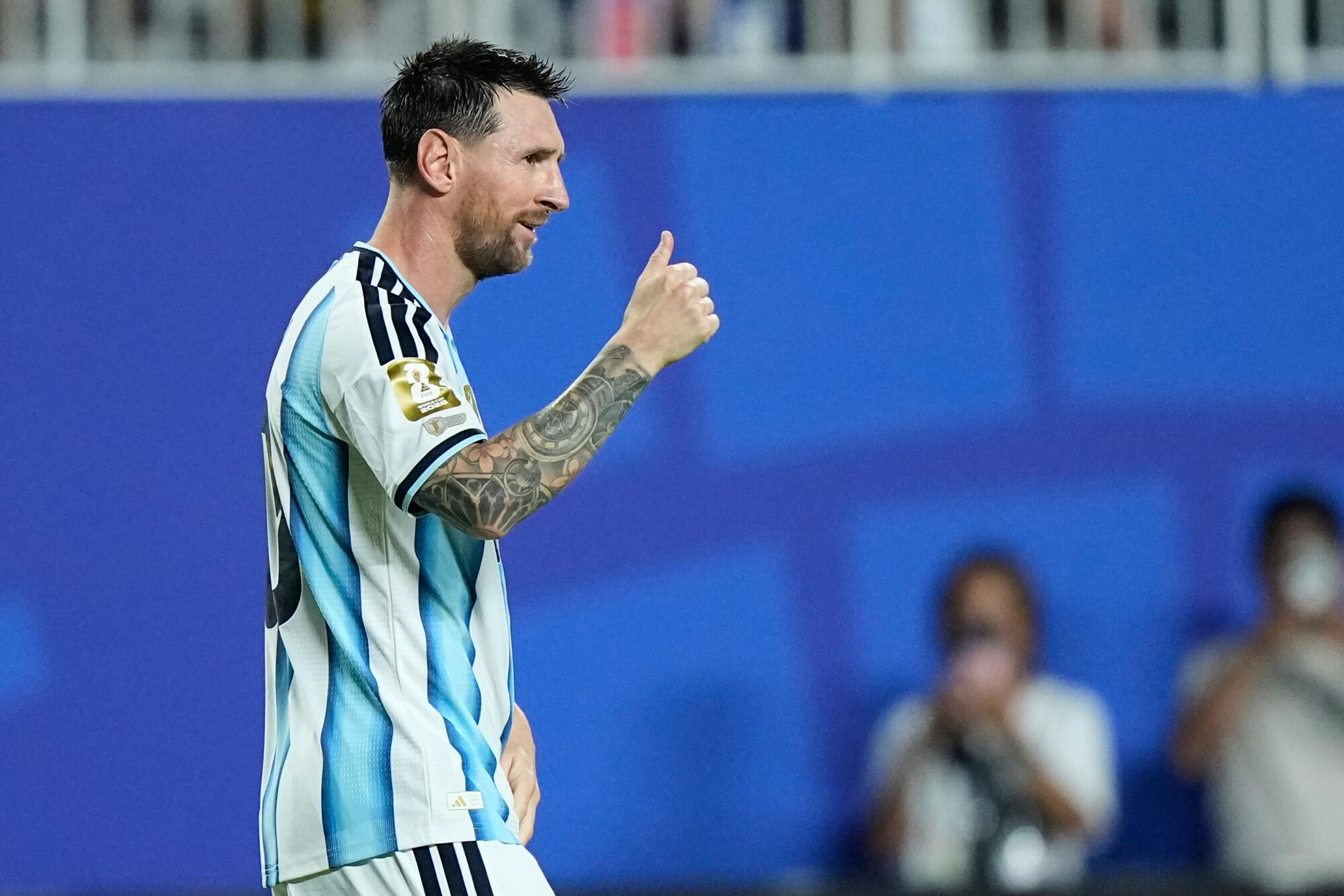 Argentina's Lionel Messi reacts after scoring his third goal against Algeria at the World Cup on June 16.