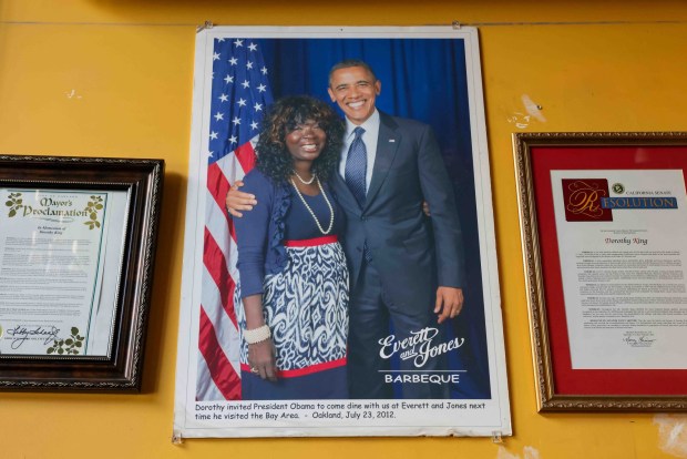 A photograph of the late Dorothy Everett, the original owner of Everett & Jones BBQ, with former President Barack Obama is displayed at the restaurant in Oakland, Calif., Friday, May 15, 2026. (Ray Chavez/Bay Area News Group)