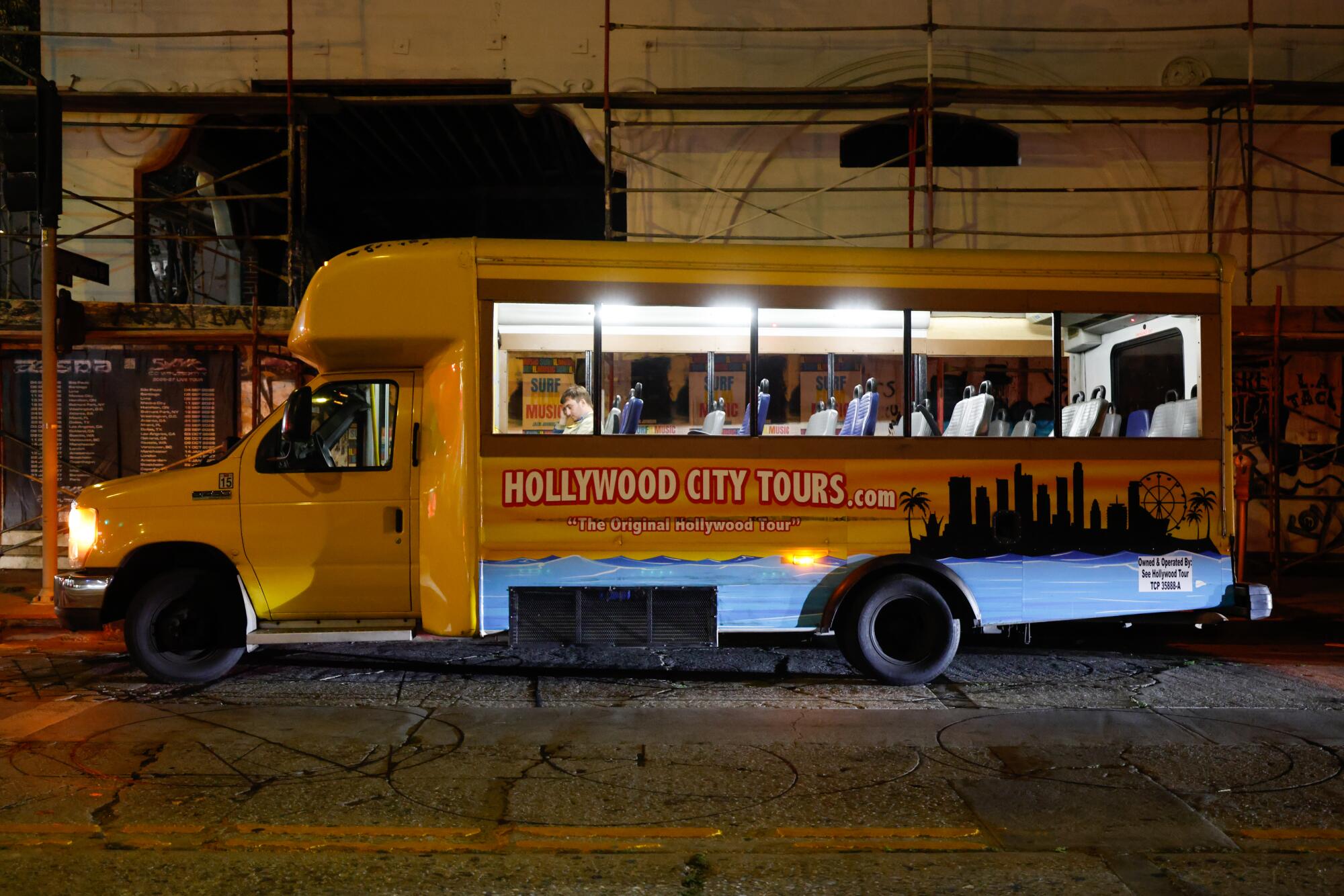 A Hollywood City Tours bus parked on the street.