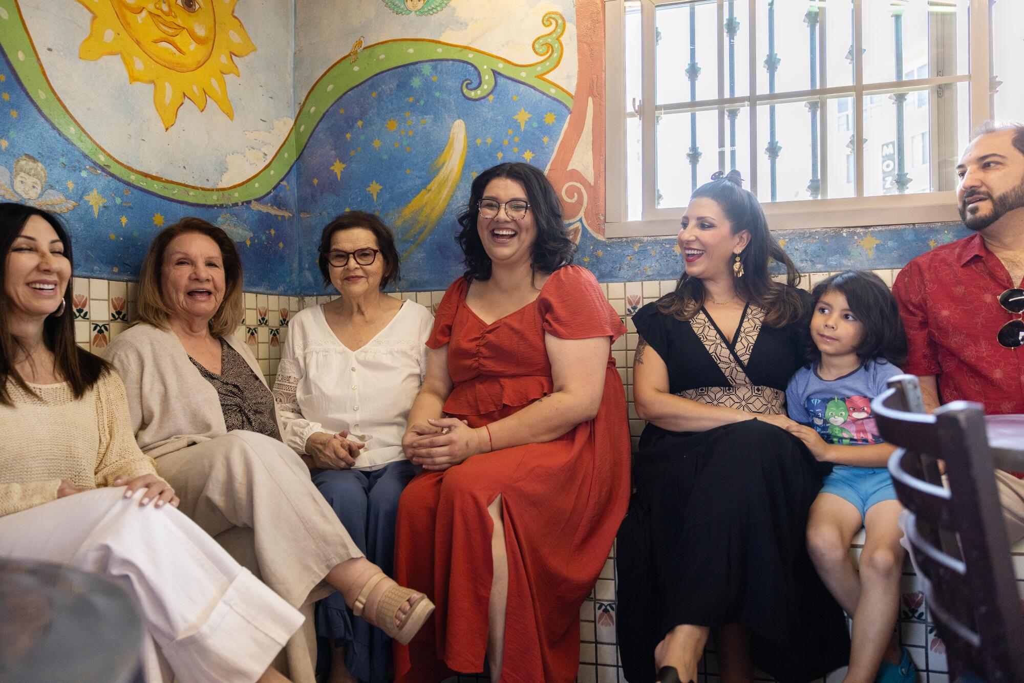 Family gather in the  dining room of their restaurant Cielito Lindo on Olvera Street.