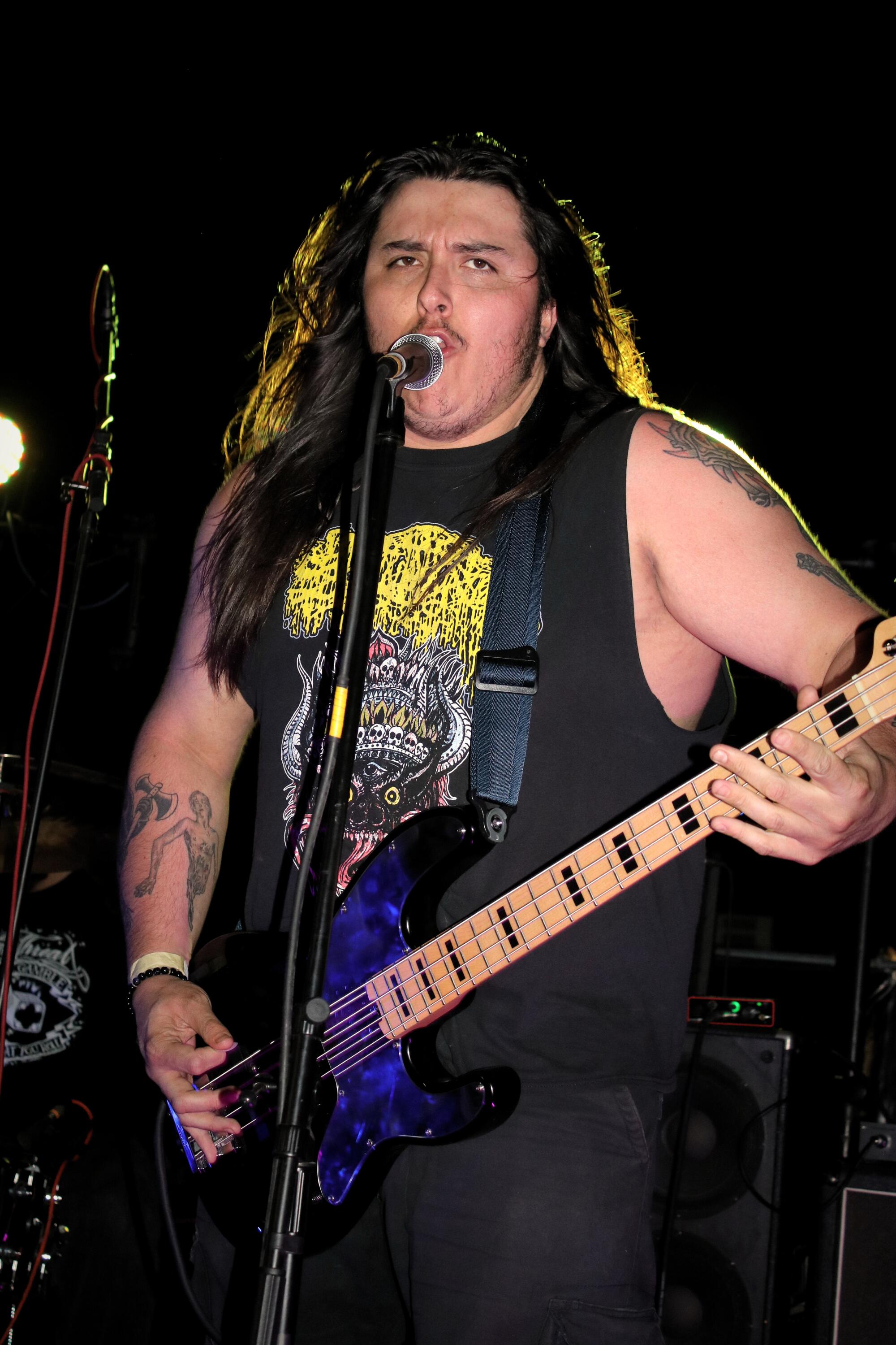 Brett Rock, bassist of San Bernardino hardcore band Big Ass Truck, performs during Creator Fest