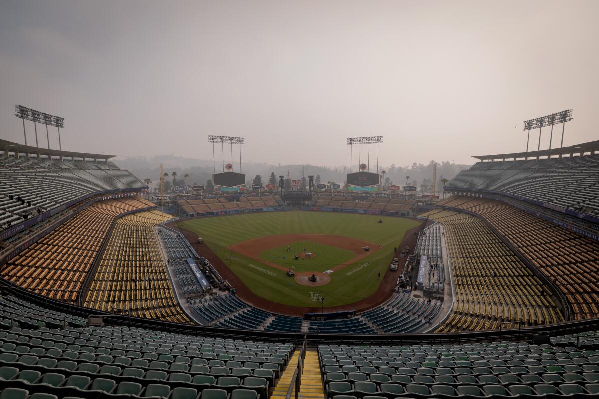 Smoke shrouds Uniqlo Field at Dodger Stadium