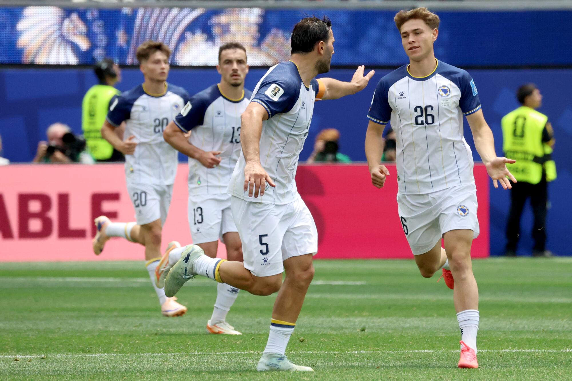 Bosnia and Herzegovina midfielder Ermin Mahmic (26) celebrates after scoring against Switzerland in the World Cup.