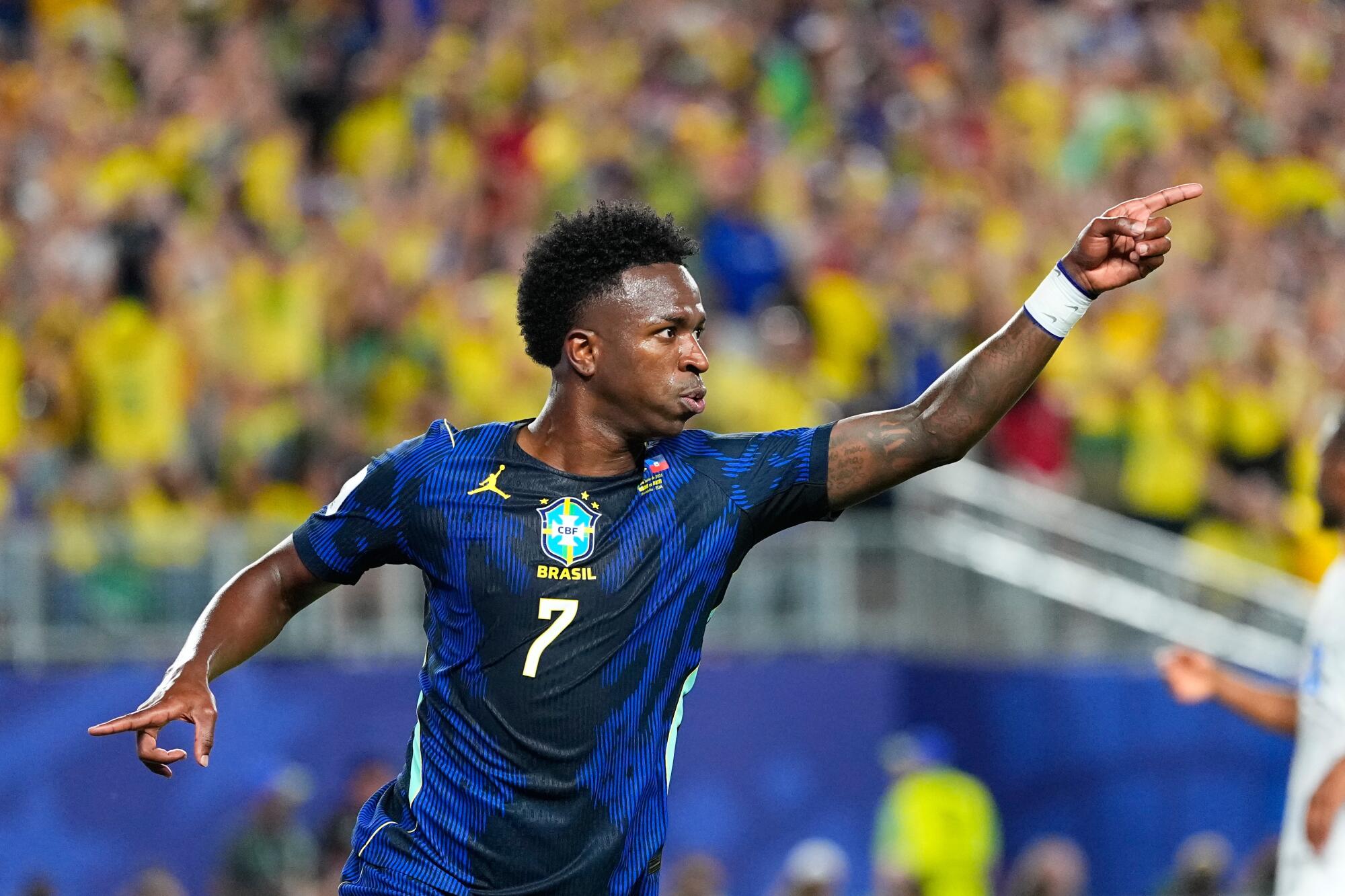 Brazil's Vinícius Júnior celebrates after scoring against Haiti on June 19.