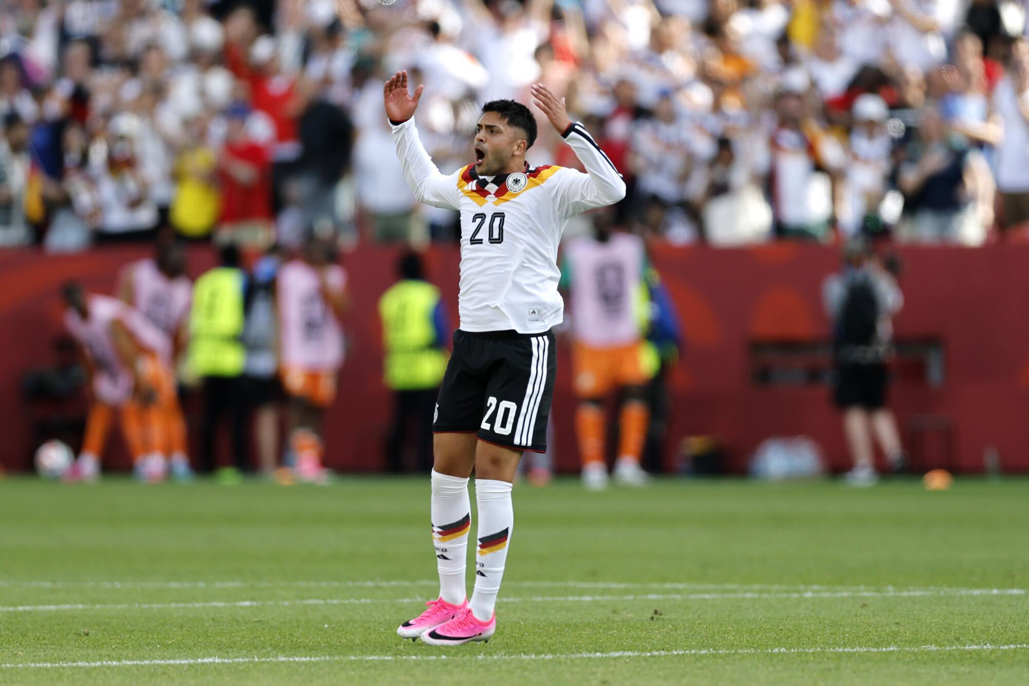 Germany's Nadiem Amiri celebrates a goal against the Ivory Coast on June 20.