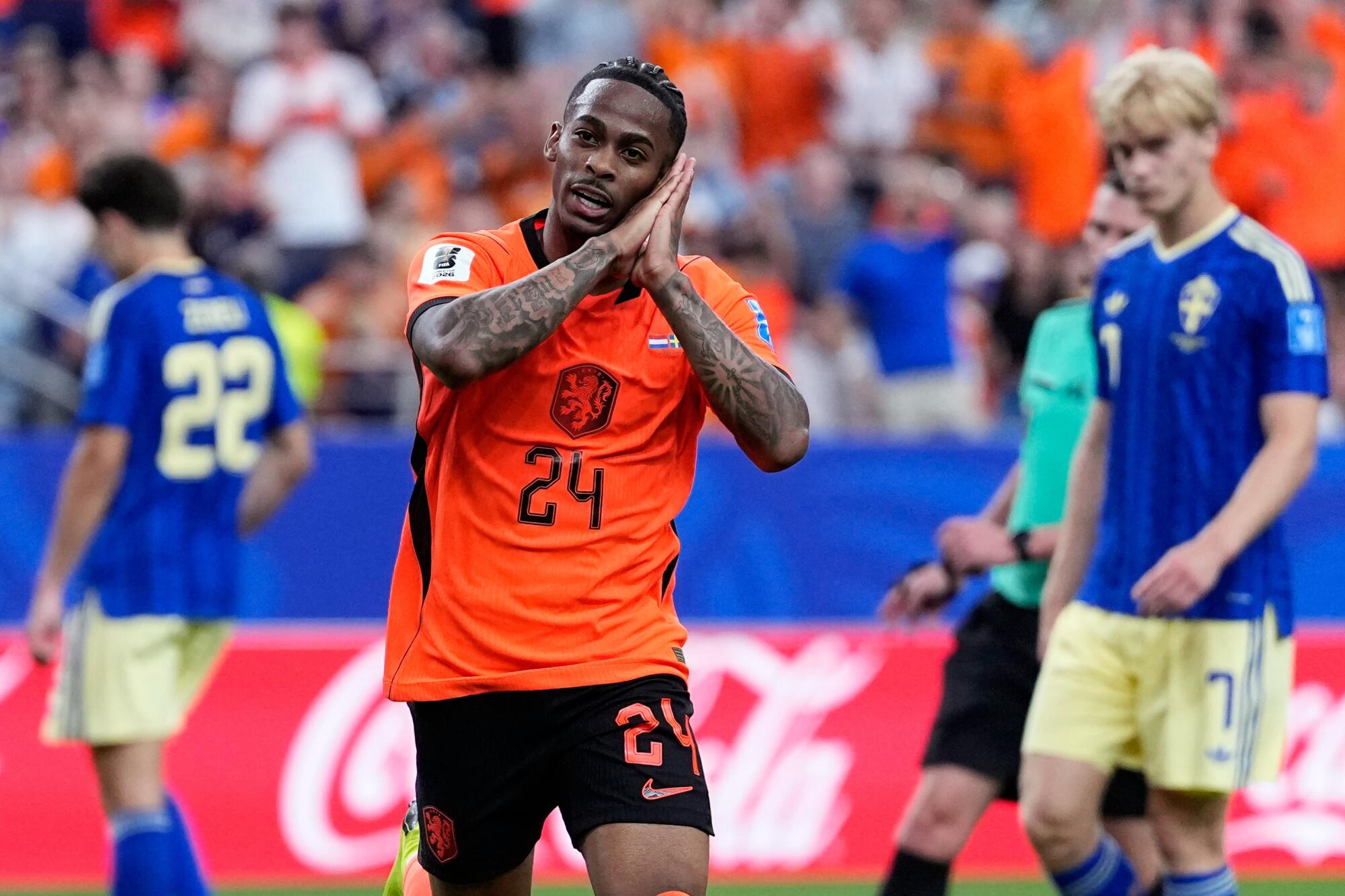 Netherlands' Crysencio Summerville celebrates after scoring against Sweden on June 20.