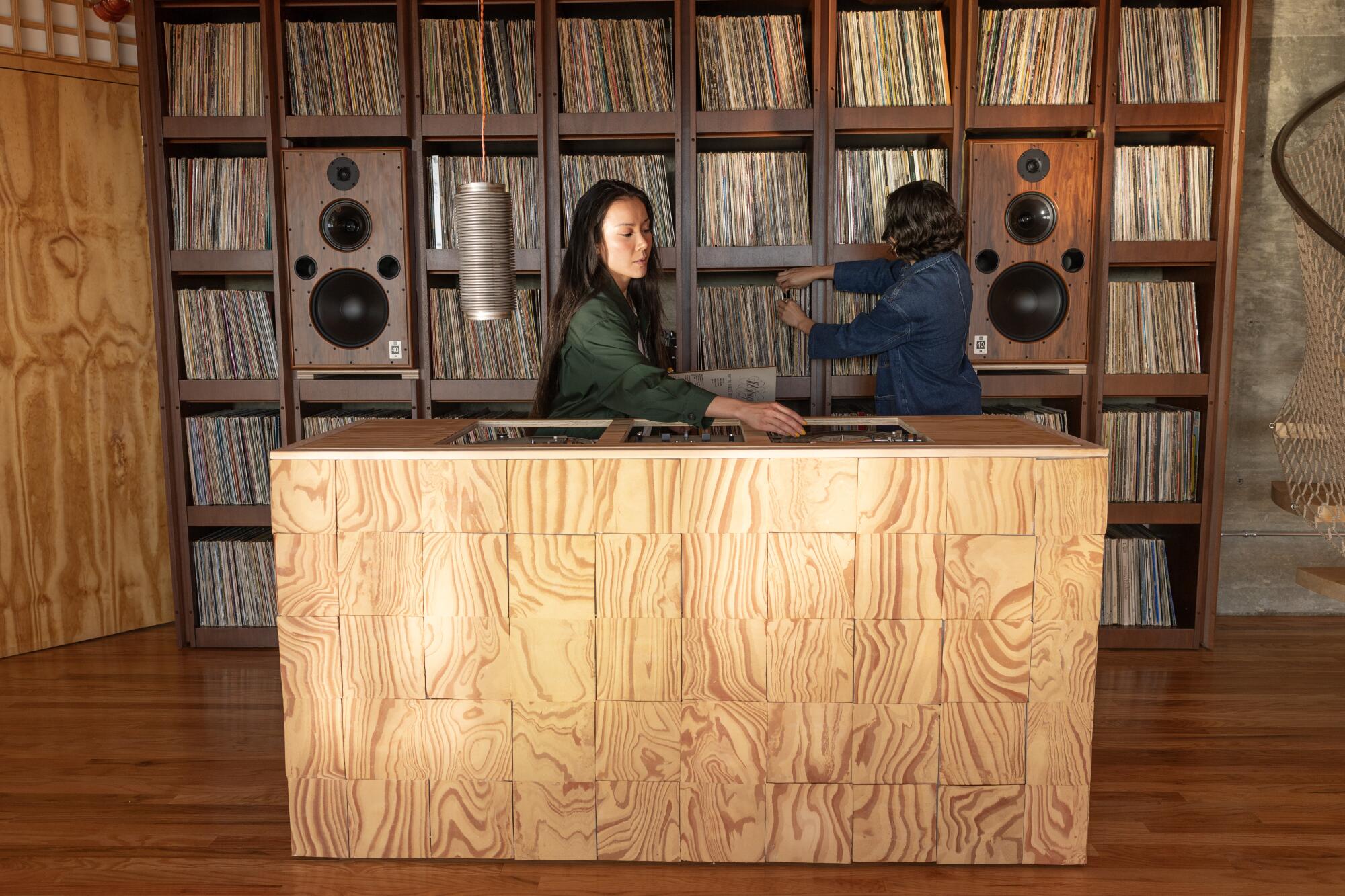 Hanna Li, left, and Jennifer Jimenez in their music room. 