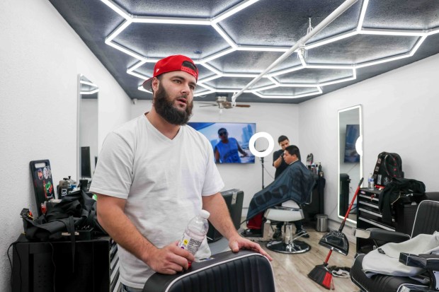 Eid Abdelwahhab owns a barber shop called Town Cuts at the International Plaza, a former motel converted into commercial spaces at the corner of International Boulevard and 17th Avenue in Oakland, Calif., on Friday, April 17, 2026. (Ray Chavez/Bay Area News Group)
