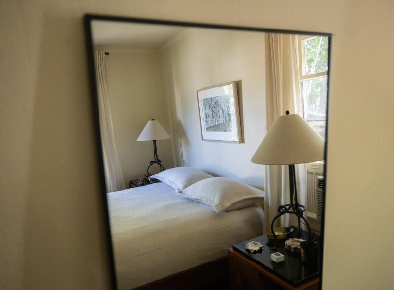 With its lighter decor, the bedroom was meant to be a sanctuary.