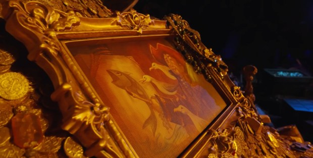 A framed portrait on a pile of gold in Scene 11 of Pirates of the Caribbean at Disneyland. (Courtesy of Disney via the official Walt Disney Imagineering YouTube channel)