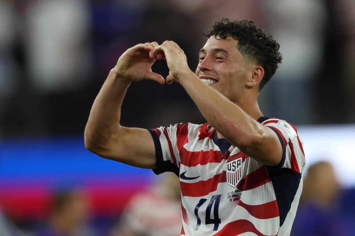 U.S. midfielder Sebastian Berhalter gestures to fans after a 4-1 win over Paraguay.