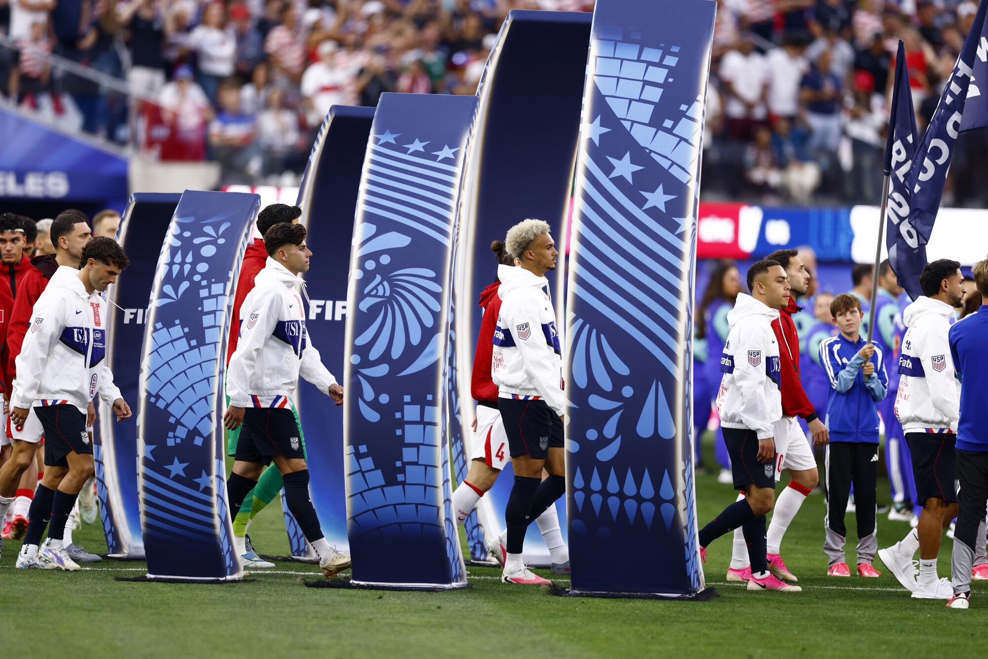 United States national soccer team enters the pitch