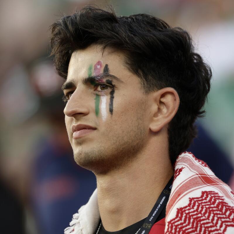 A Jordan fan during the first half of a World Cup group stage match between Jordan and Algeria.
