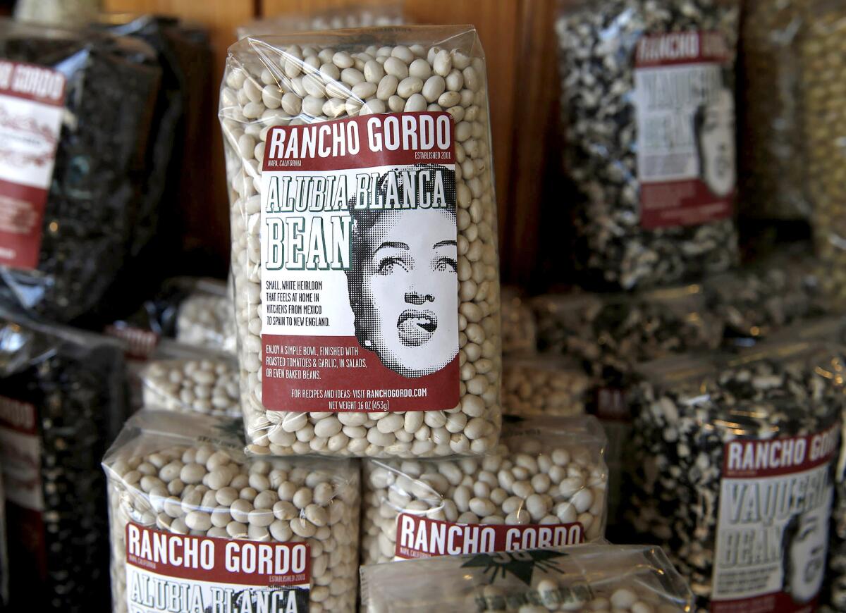 A selection of alubia blanca beans are just one of the many specialty foods sold at the Alta Baja Market.
