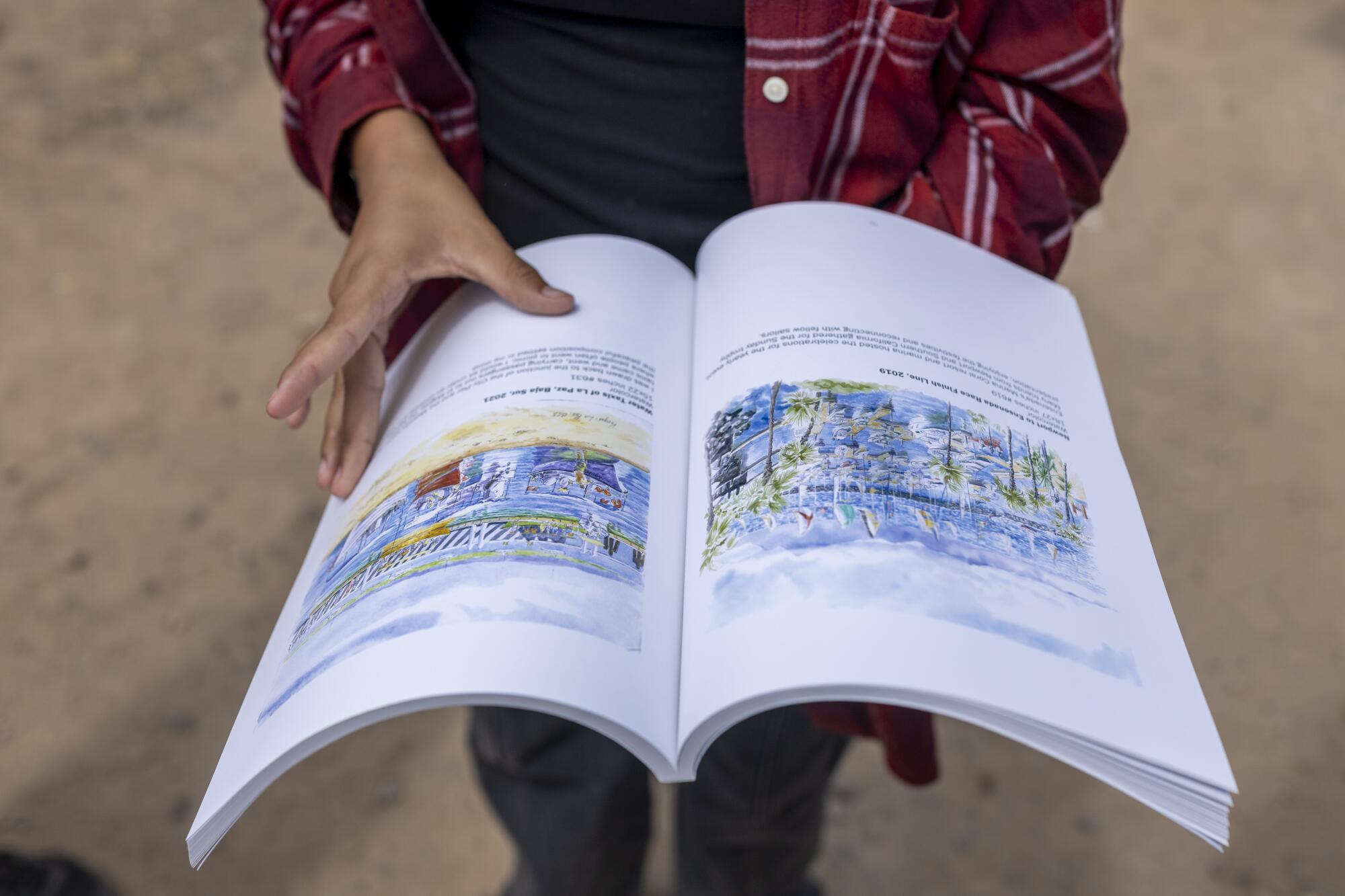 Mariana Rodriguez Elizarraraz, center, looks through an art book