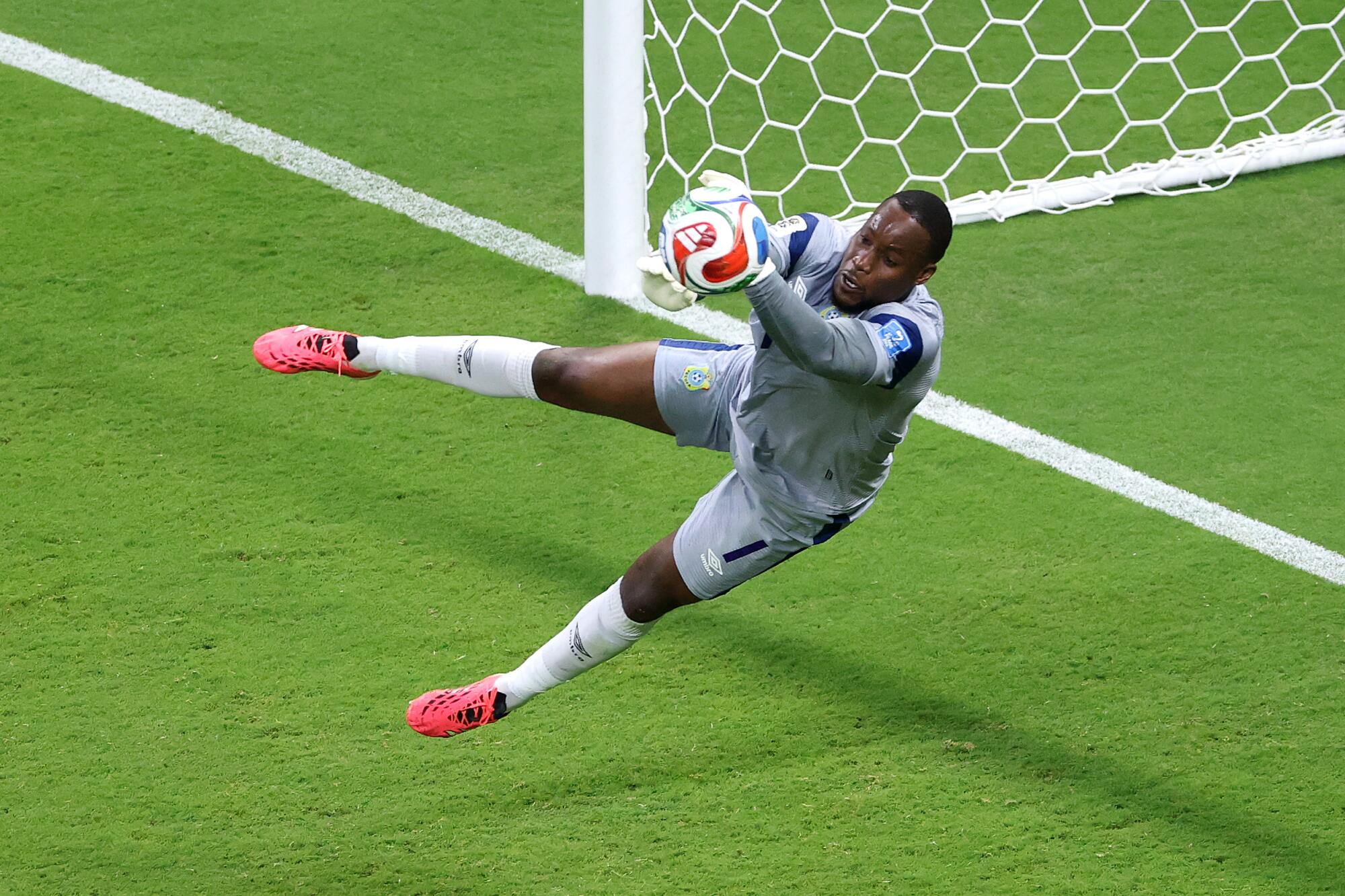Democratic Republic of the Congo goalkeeper Lionel Mpasi makes a save against Colombia at the World Cup on June 23.