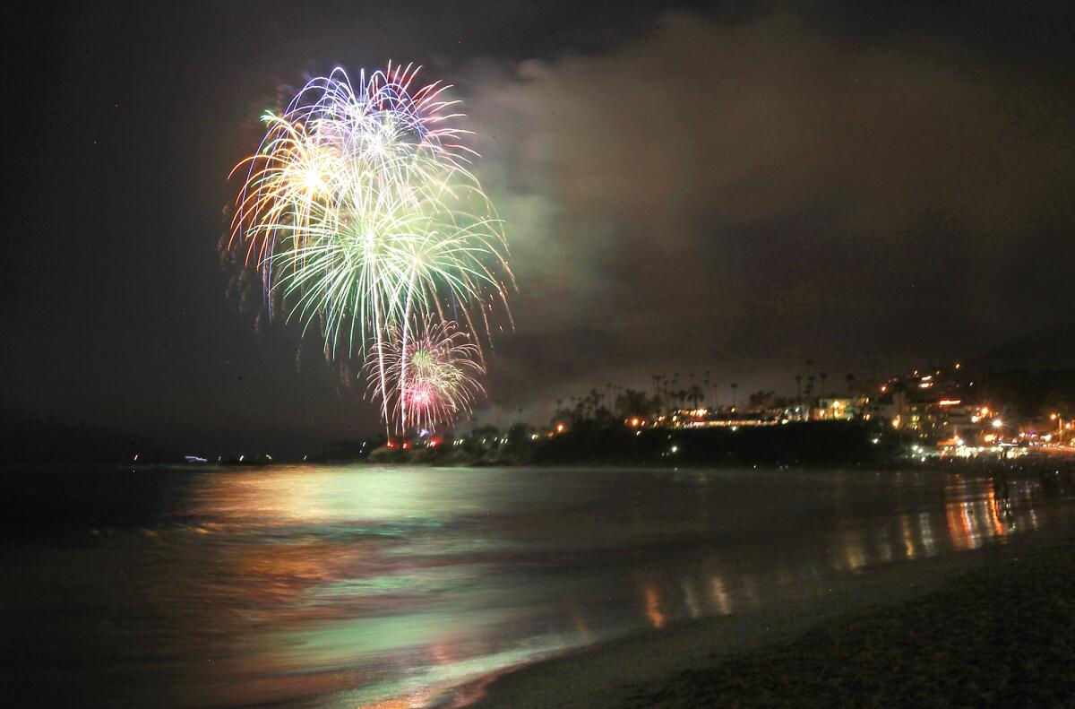 Fireworks light up the sky in a burst of color during a Laguna Beach Fourth of July fireworks show.