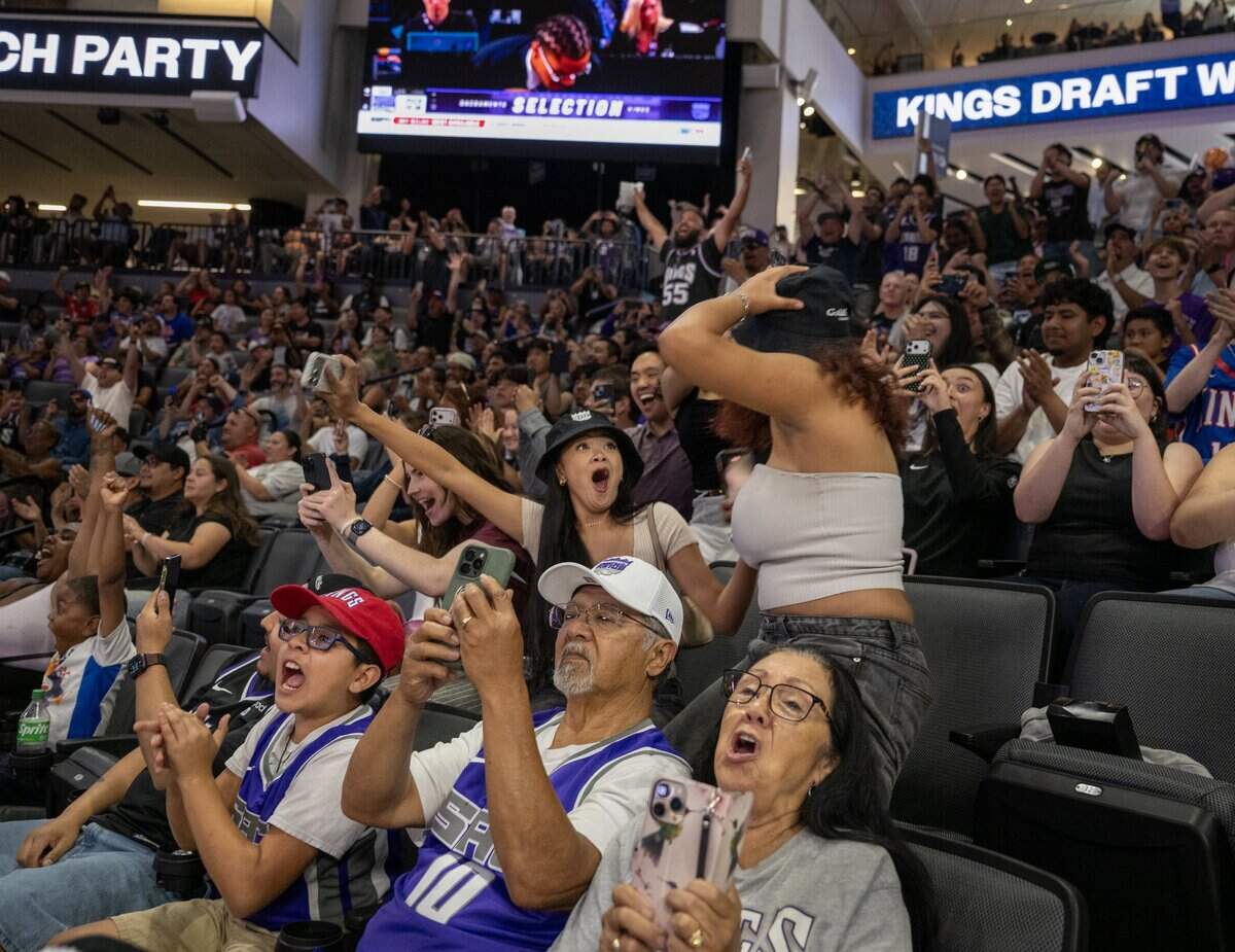 Fans react after the Sacramento Kings selected Darius Acuff Jr. on June 23 at Golden 1 Center.