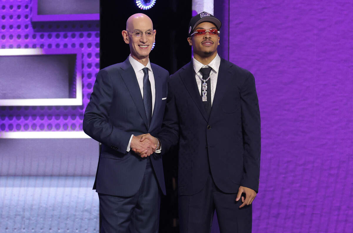 NBA commissioner Adam Silver greets Arkansas guard Darius Acuff Jr., the seventh pick in the 2026 NBA draft, after he was selected by the Sacramento Kings at Barclays Center on Tuesday.