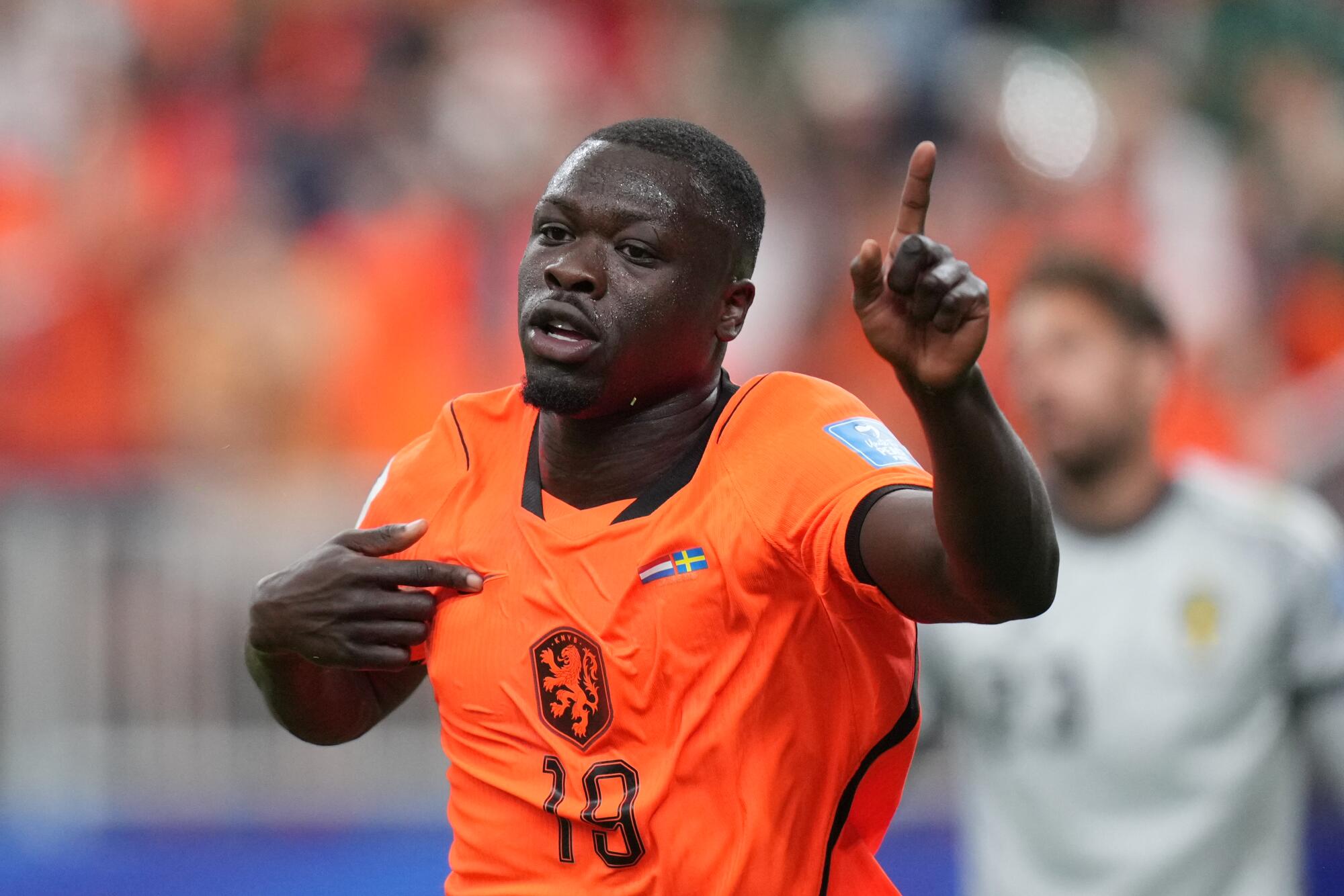 Brian Brobbey celebrates after scoring for the Netherlands in a win over Sweden at the World Cup on June 20.