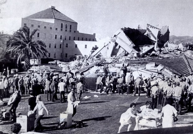 The 1971 San Fernando earthquake (also known as Sylmar earthquake) struck the San Fernando Valley near Sylmar at 6:00:55 a.m. PST on February 9, 1971, with a magnitude of 6.6. This scene is of the rescue efforts at the collapsed Vetreans Hospital in Sylmar where most of the 64 deaths occurred. (Daily News File Photos.)