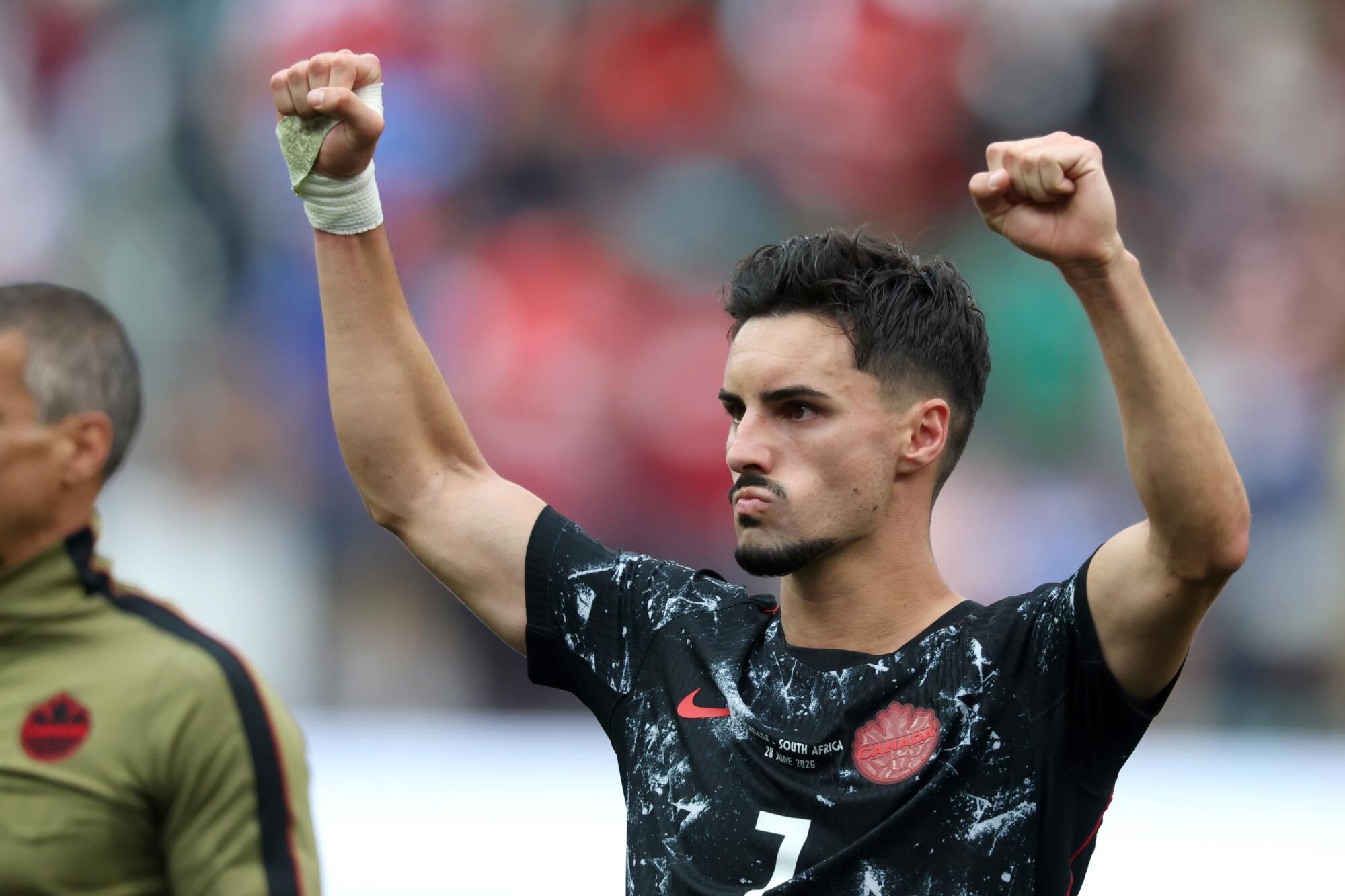 Canada's Stephen Eustáquio reacts after a 1-0 win over South Africa at the World Cup on Sunday at SoFi Stadium.
