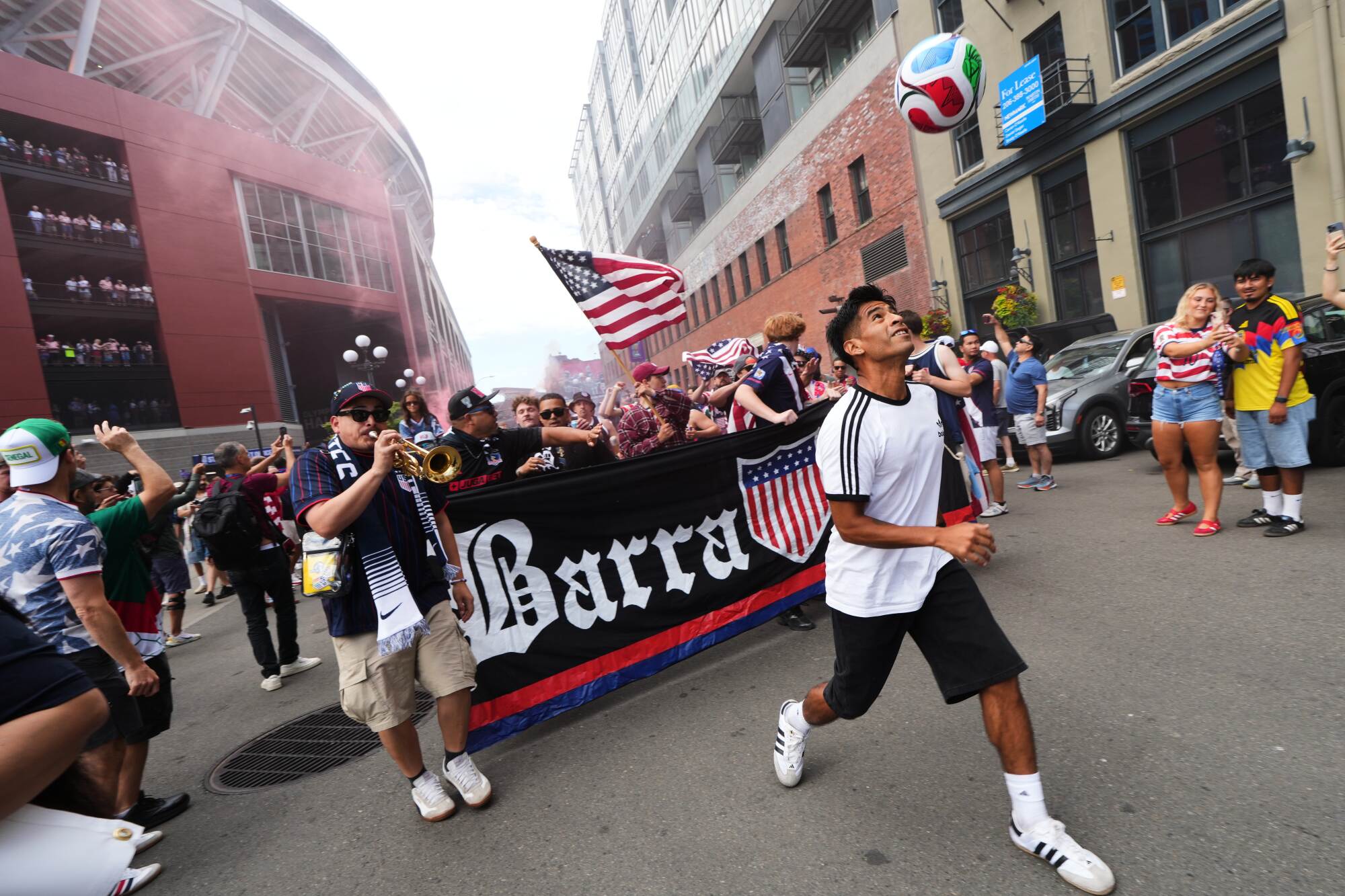 U.S. fans march outside Lumen Field in Seattle before the U.S.-Australia World Cup game on June 19, 2026.