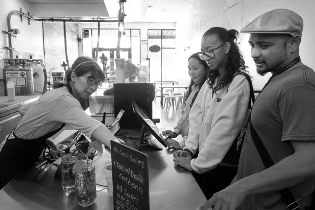 Customers order desserts from Susan Louie at Cauldron Ice Cream in San Jose on Wednesday, June 17, 2026. (Kayla Lee/Mosaic)