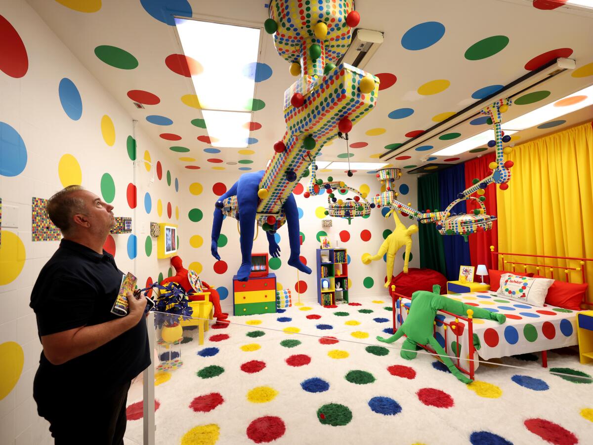 A man stands in the Twister theme room at the Hospital of Emotions at St. Vincent Hospital in Los Angeles
