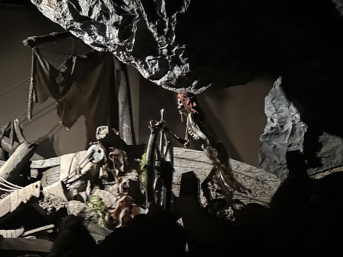 Dead pirates fill the caverns of Disneyland's Pirates of the Caribbean.