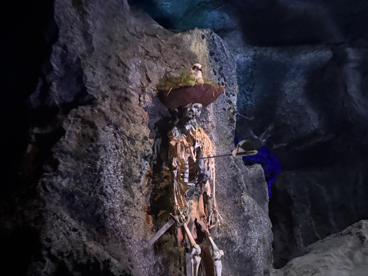 The caverns of Pirates of the Caribbean set a foreboding tone.