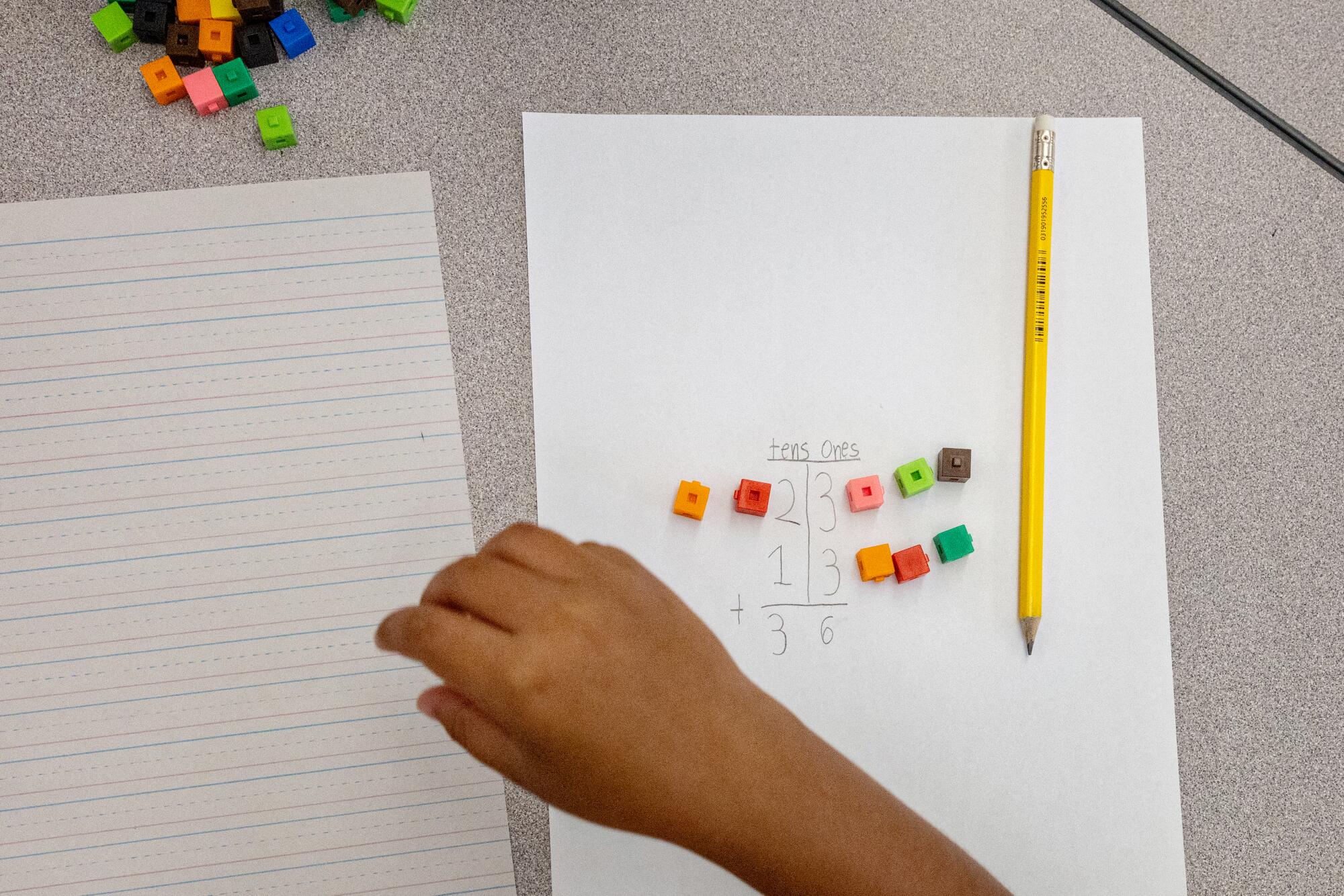 A student at Laurel Street Elementary working on a math activity