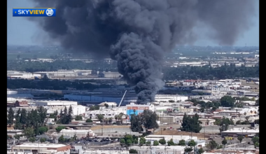 Large warehouse fire erupts in Southeast Fresno