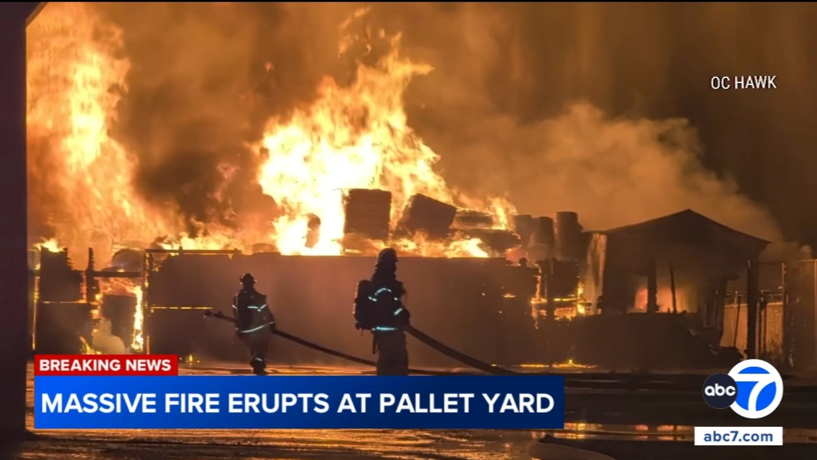 Massive fire erupts at pallet yard in Orange