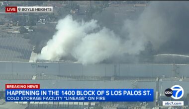 Drivers react to large building fire burning in Boyle Heights