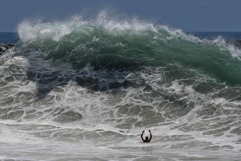 Historic swells continue to batter California beaches. When will the surf die down?