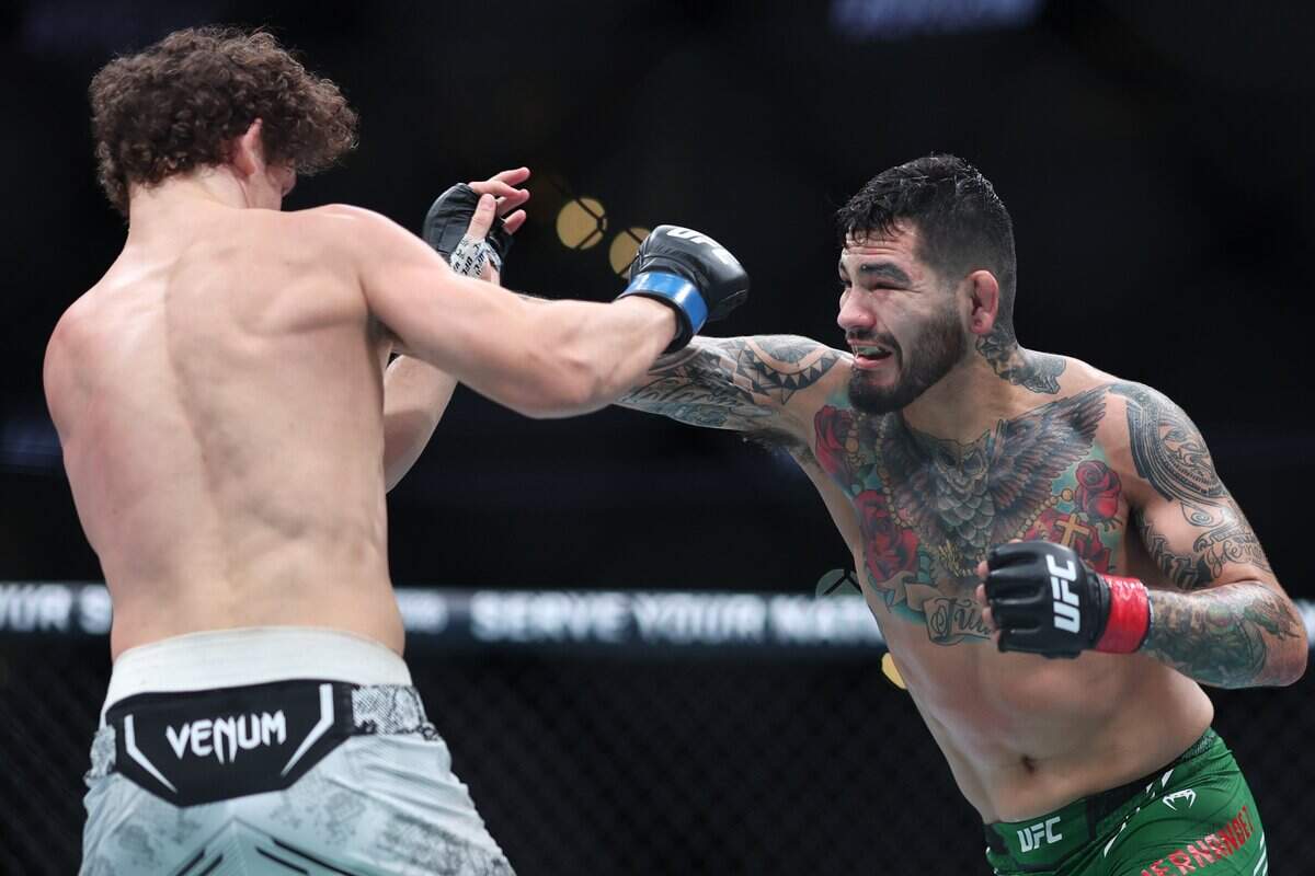 ANAHEIM, CALIFORNIA - FEBRUARY 17: Anthony Hernandez exchanges strikes with Roman Kopylov in their middleweight fight during UFC 298 at Honda Center on February 17, 2024 in Anaheim, California. (Photo by Sean M. Haffey/Getty Images)