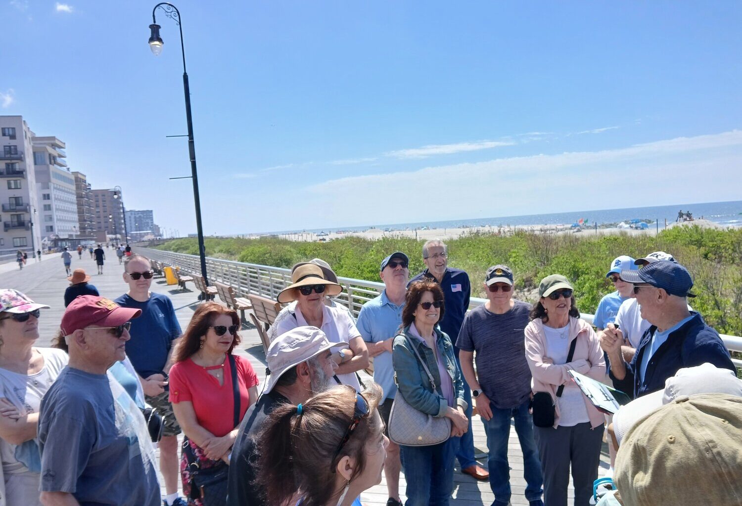 Joel Greenberg, far right, gave more than two dozen out-of-towners a look at the city