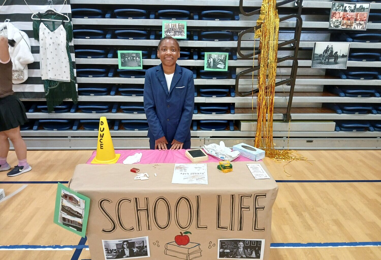 Erica Parler, a fifth grader, explained what life was like for the first students of West Elementary &mdash; including daily tests, ink-dipping fountain pens and the threat of wearing the dunce cap.