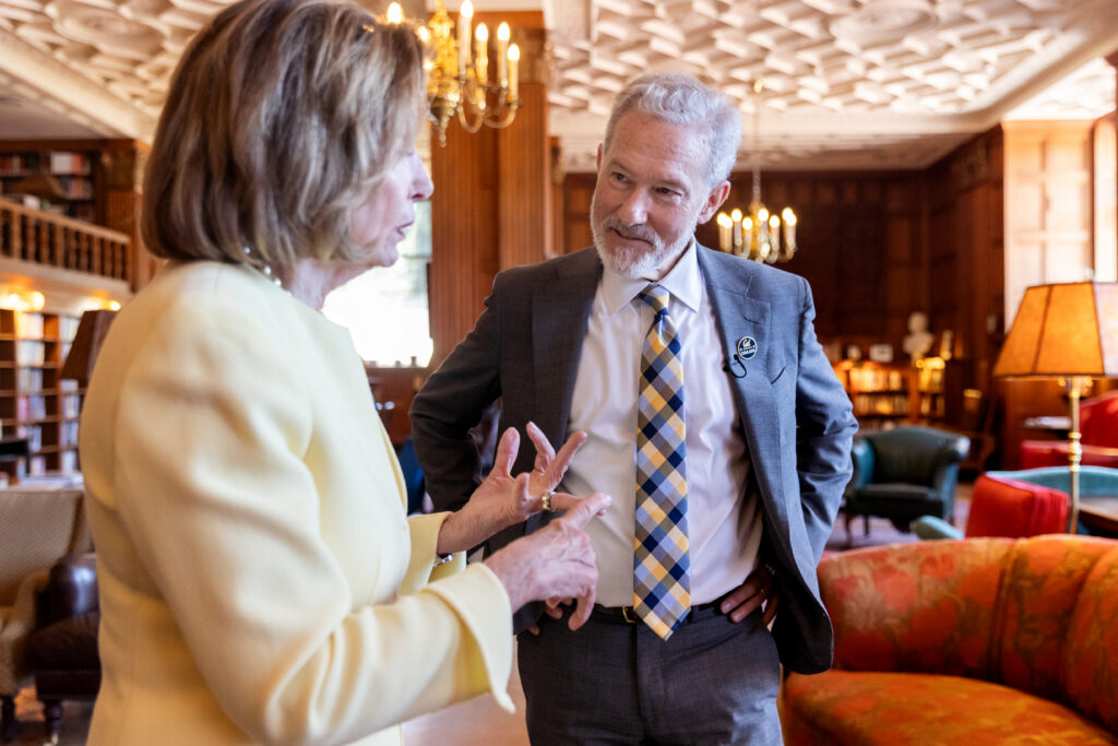 Chancellor Rich Lyons and Rep. Nancy Pelosi speak on the UC Berkeley campus.